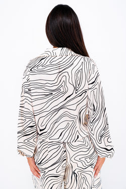 Collection of Printed Wave Loose Trousers in a gallery layout